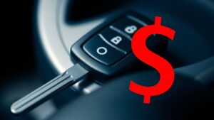 Car key with a large dollar sign over it.